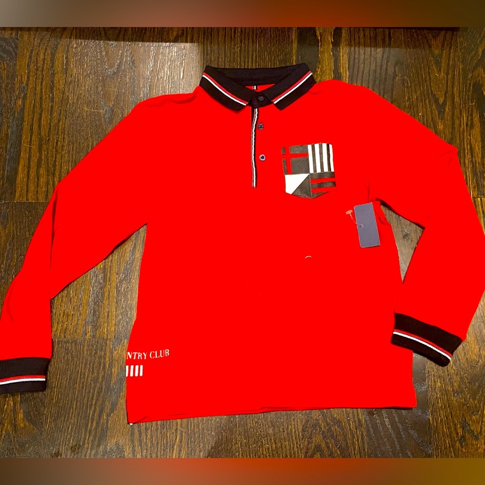 Nukutavake long sleeve polo shirt w sports/ racing designs. NWOT.